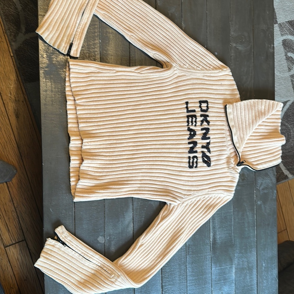 Beige DKNY sweater with zippers on collar and sleeves perfect condition size L